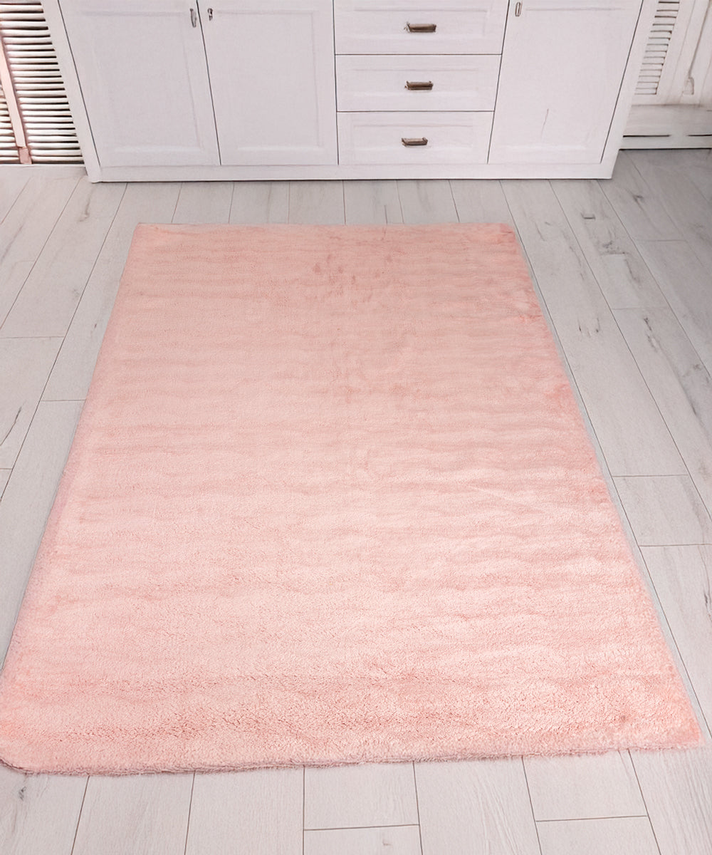 Alfombra de lana rosa
