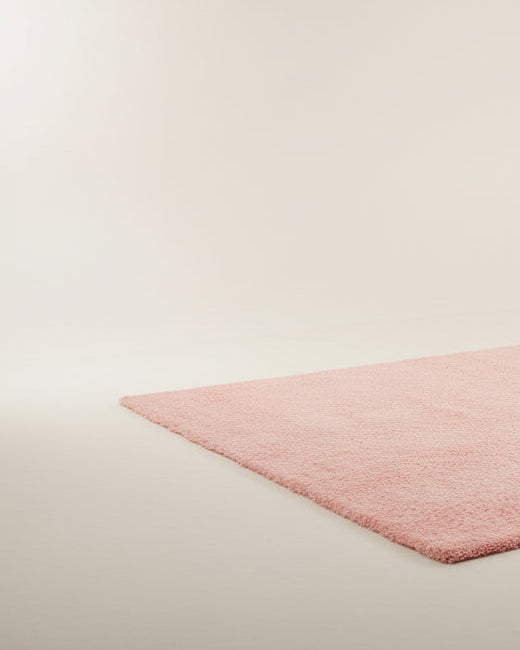 Alfombra de lana rosa