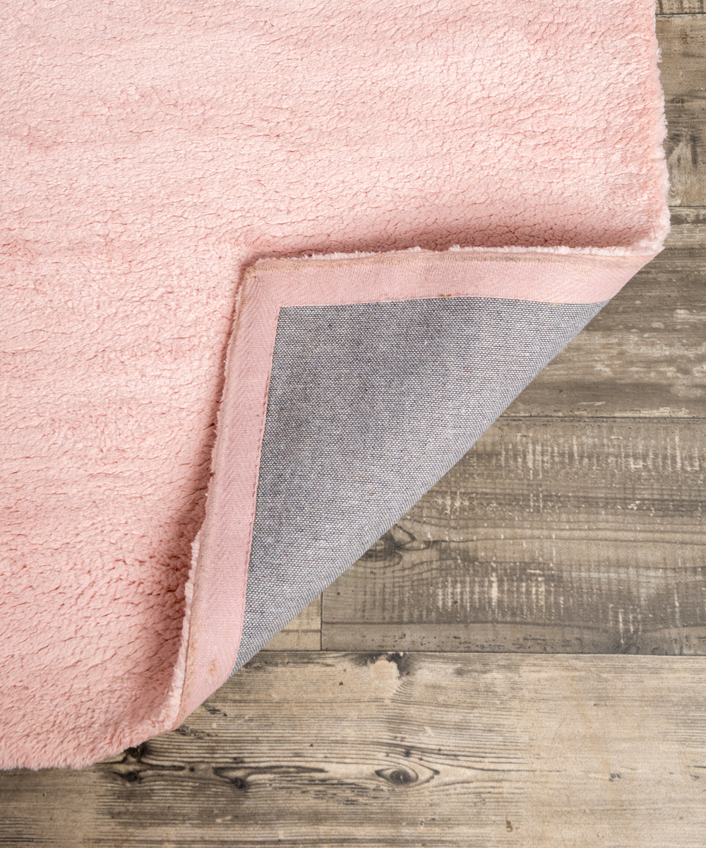 Alfombra de lana rosa