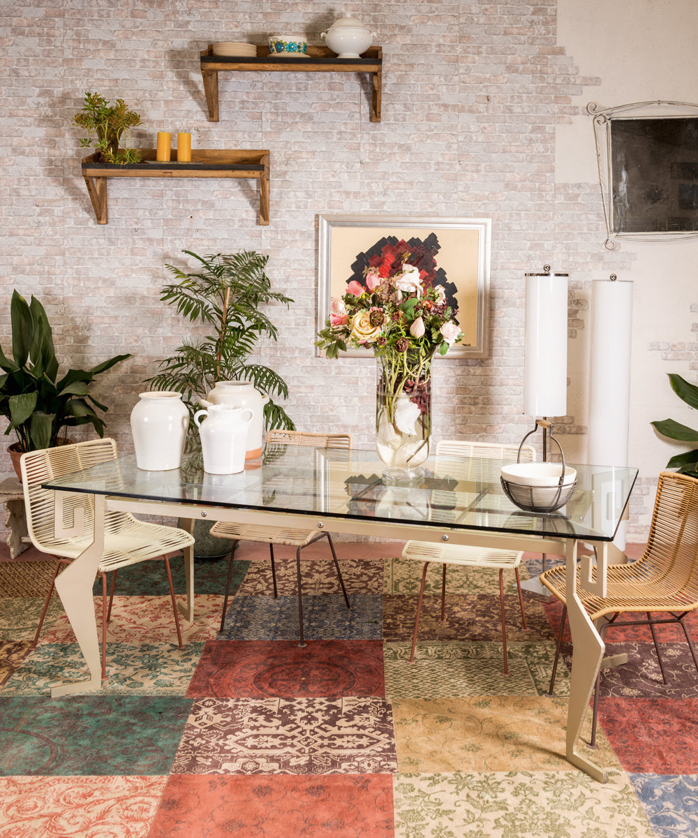 Wrought iron and glass designer table