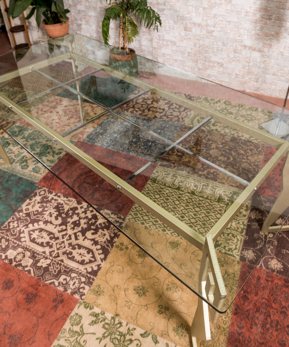 Wrought iron and glass designer table