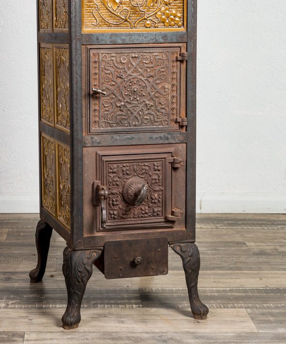 Estufa antigua de hierro fundido - Antique arte y decoracion
