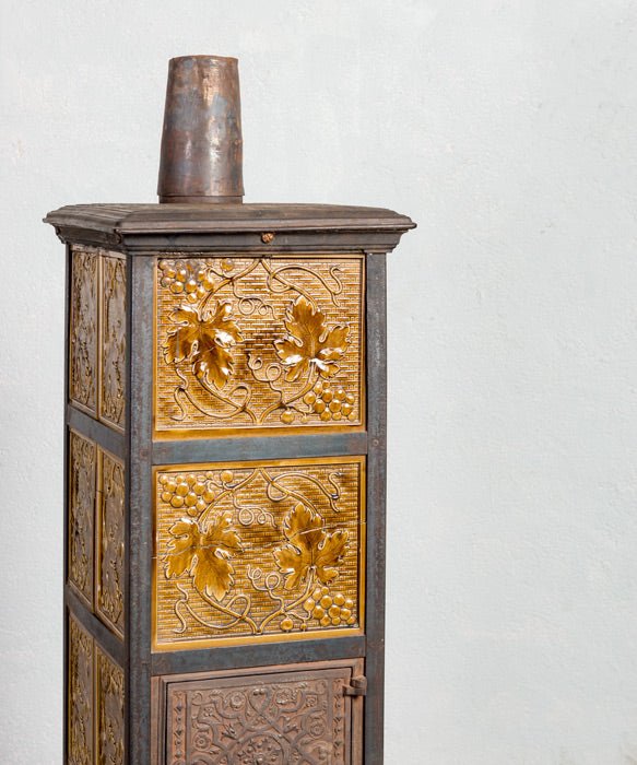 Estufa antigua de hierro fundido - Antique arte y decoracion