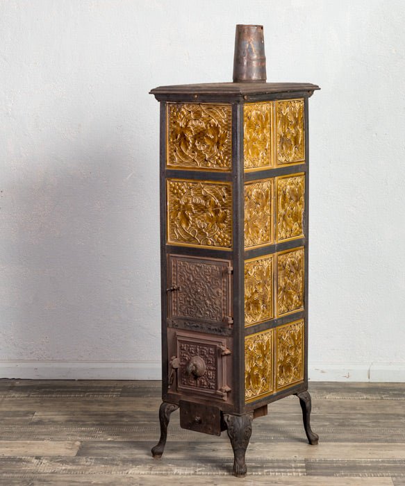 Estufa antigua de hierro fundido - Antique arte y decoracion