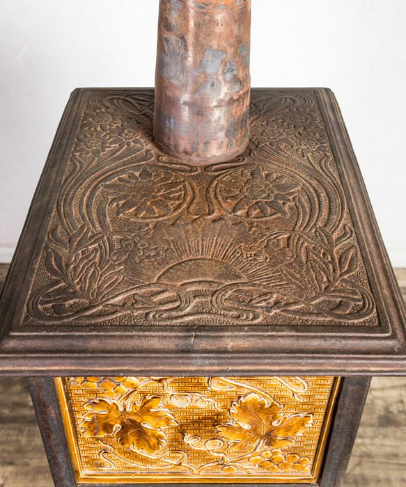 Estufa antigua de hierro fundido - Antique arte y decoracion