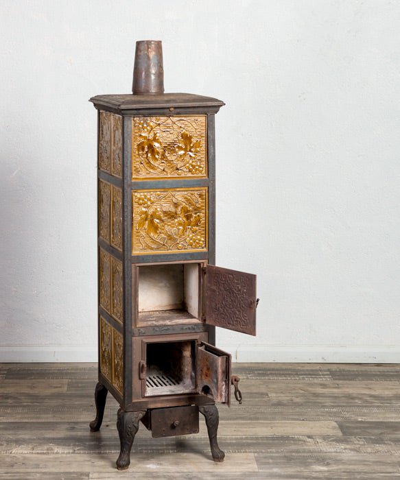Estufa antigua de hierro fundido - Antique arte y decoracion
