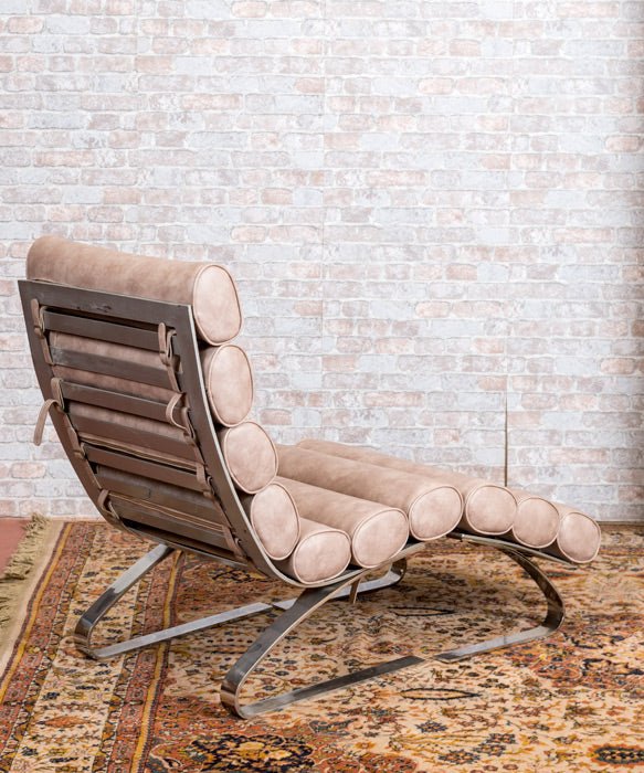 Sillón de diseño con reposapiés - Antique arte y decoracion