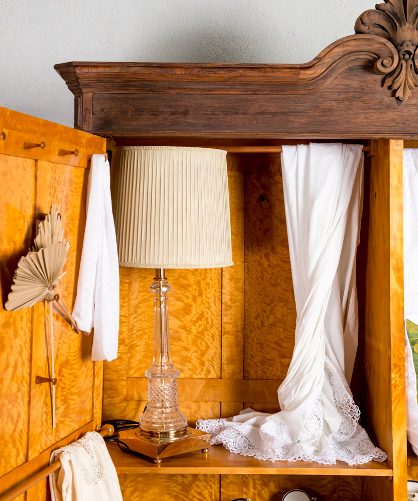 Antique wardrobe with upholstered doors