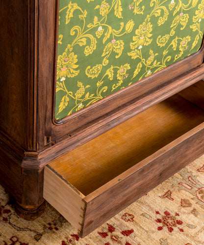 Antique wardrobe with upholstered doors