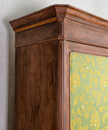 Antique wardrobe with upholstered doors