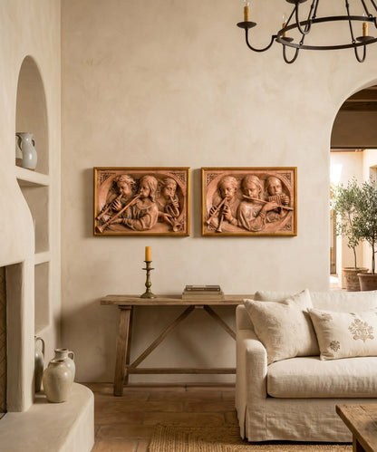 Pareja de cuadros en altorrelieve de querubines músicos en marmolina (Estilo Renacentista)