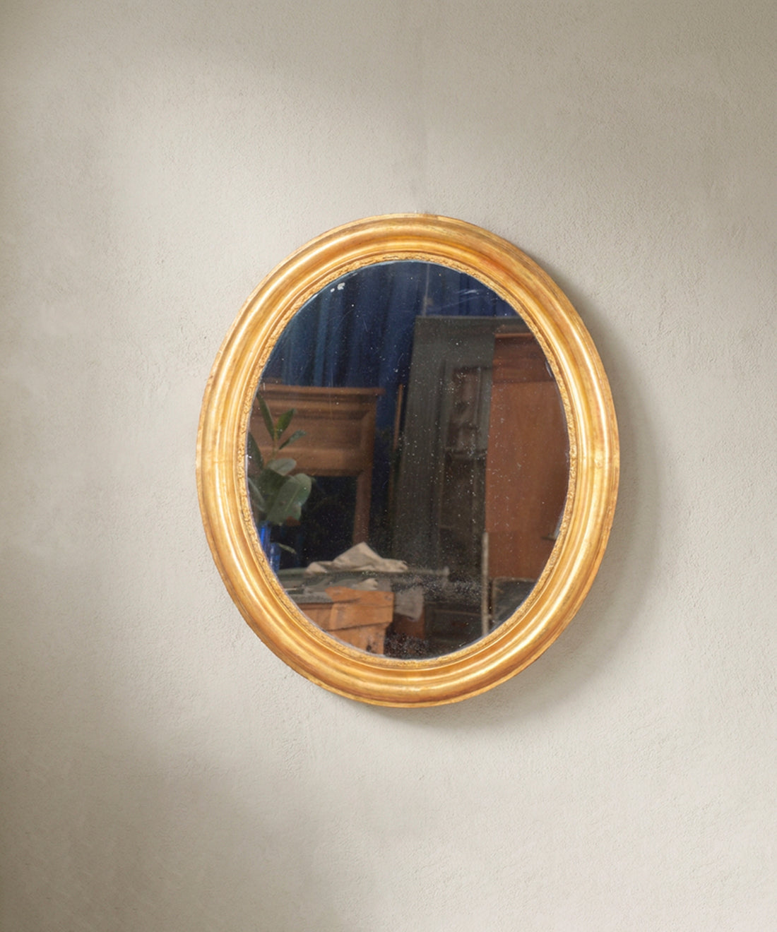 Espejo antiguo ovalado dorado al pan de oro vista frontal — Antique Arte y Decoración