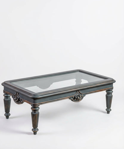 Mesa de centro vintage gris oscuro vista desde arriba mostrando la transparencia del cristal