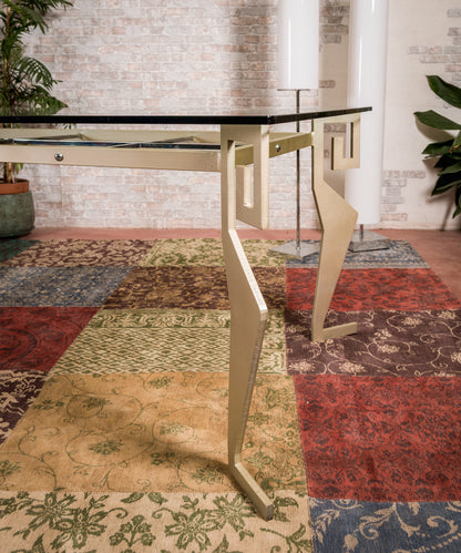 Wrought iron and glass designer table