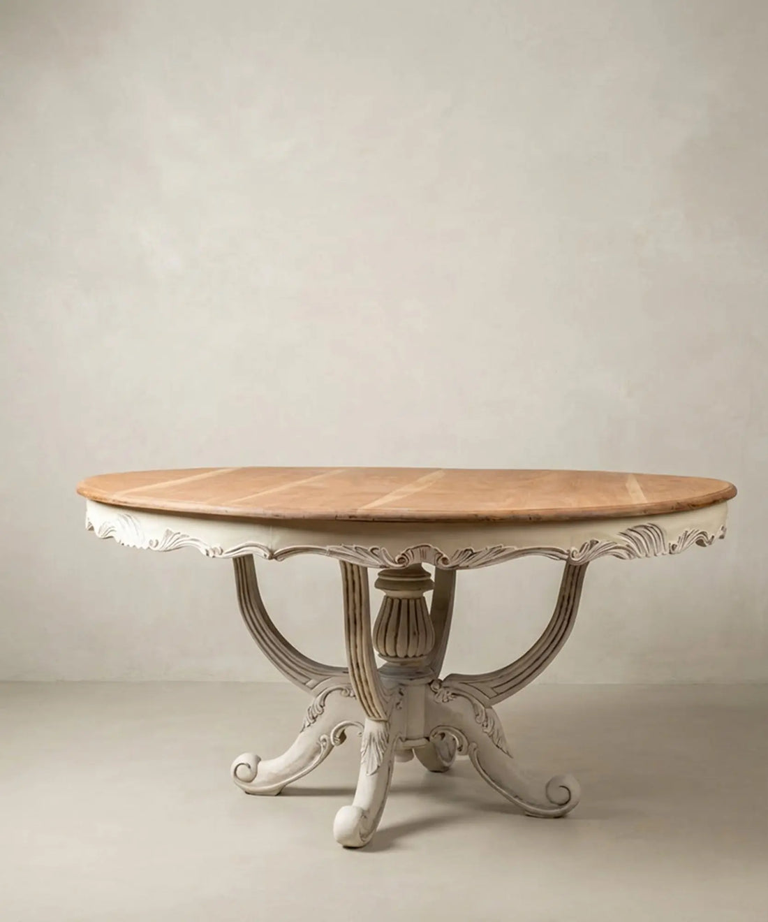 Mesa de Comedor Redonda Antigua en Caoba con Pedestal Tallado Bicolor