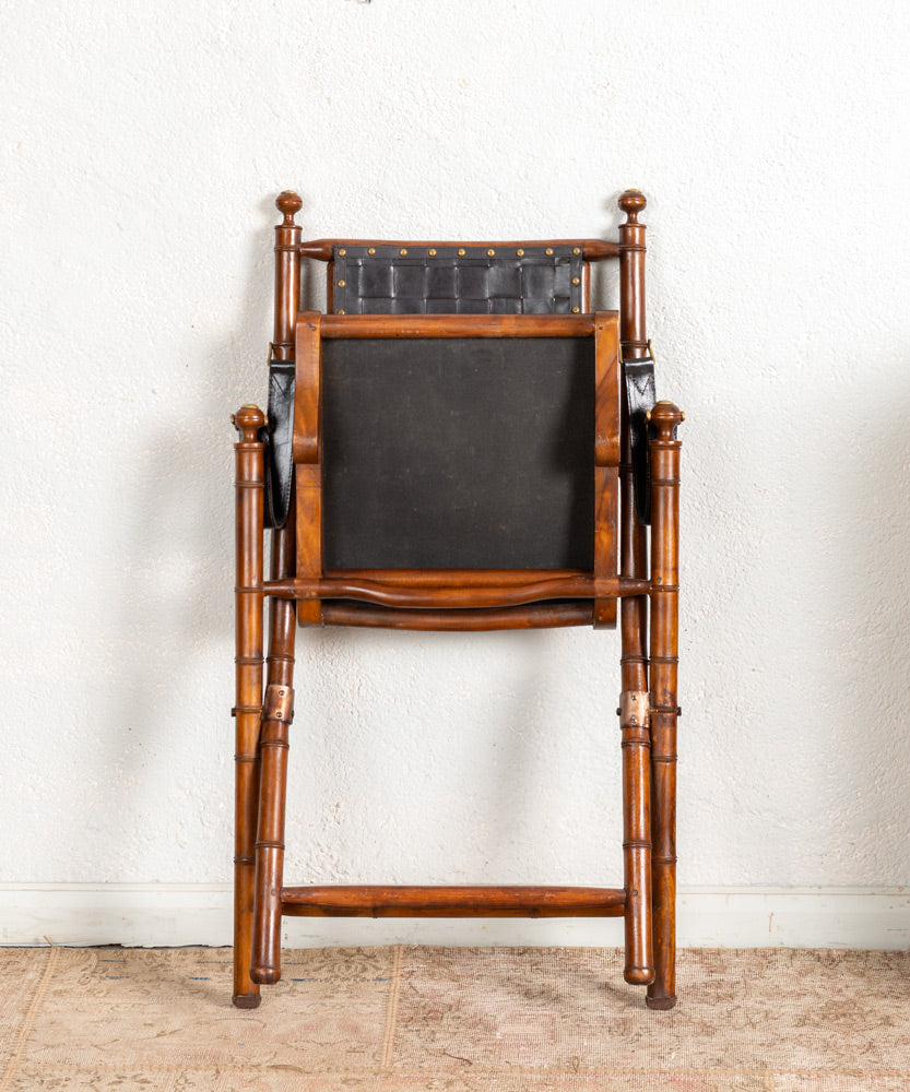 Antique campaign armchair
