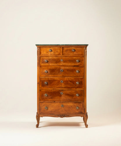 Sinfonier semanario antiguo de madera con cajones de marquetería geométrica y tapa de mármol.