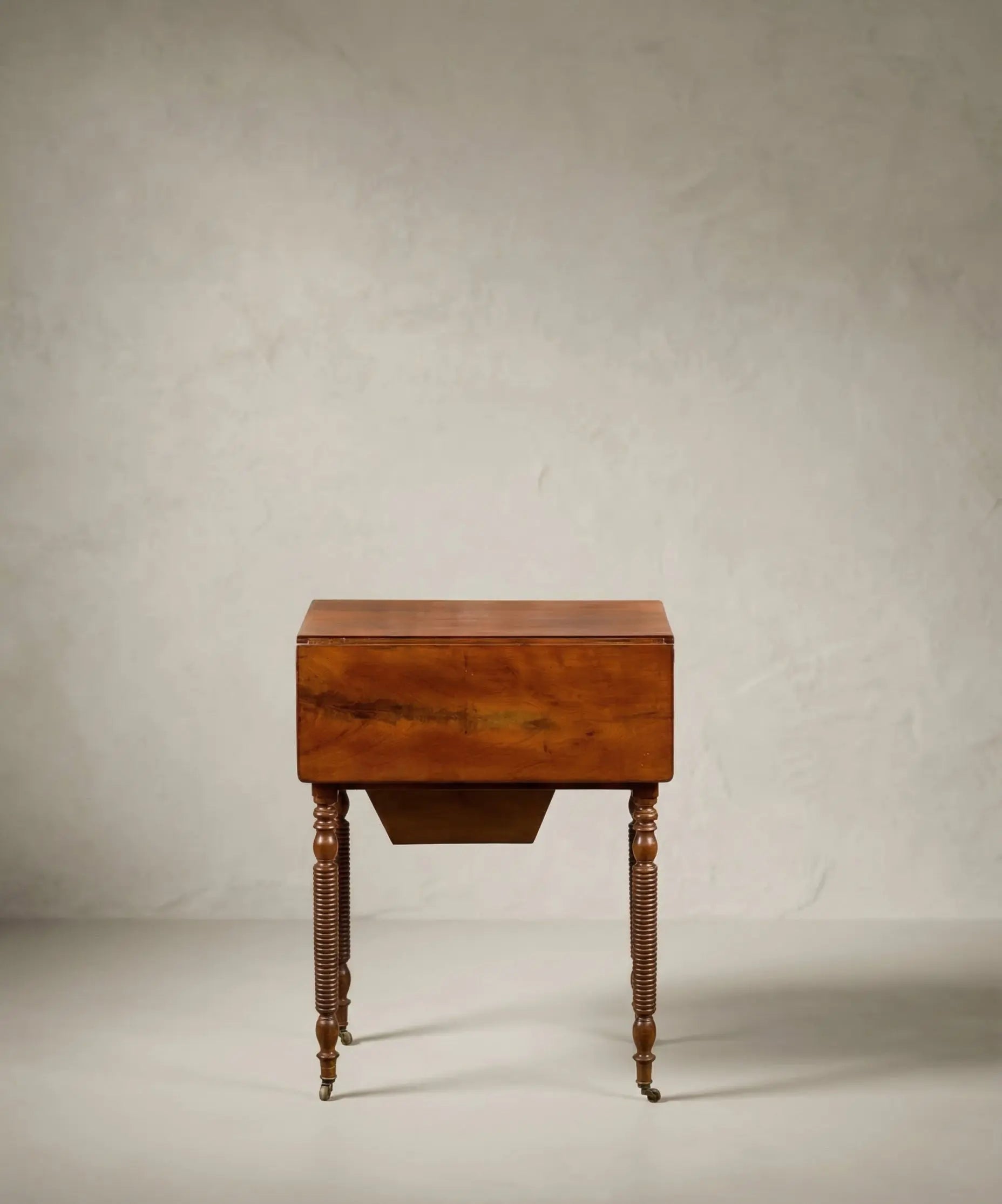 Mesa costurero antigua en palma de caoba con alas abatibles (S. XIX)