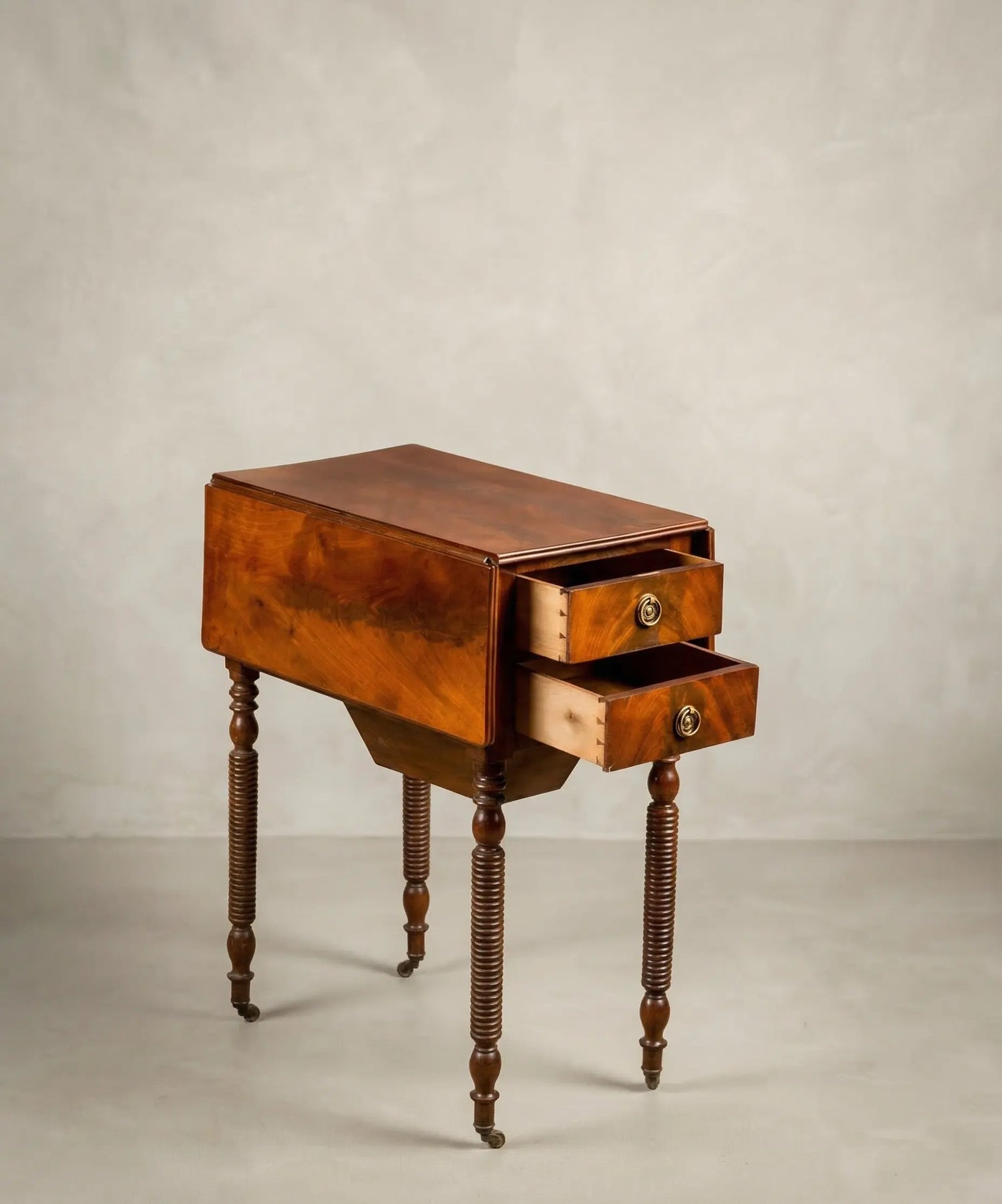 Mesa costurero antigua en palma de caoba con alas abatibles (S. XIX)