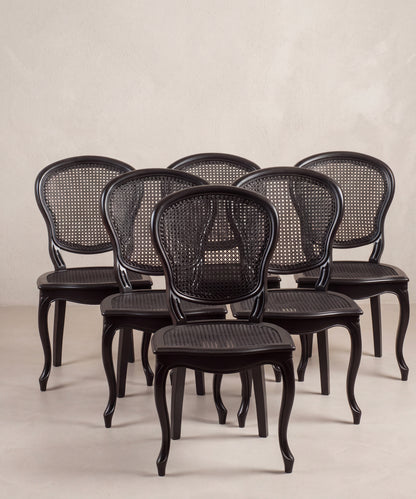 Conjunto de seis sillas vintage de rejilla negras vista frontal — Antique Arte y Decoración