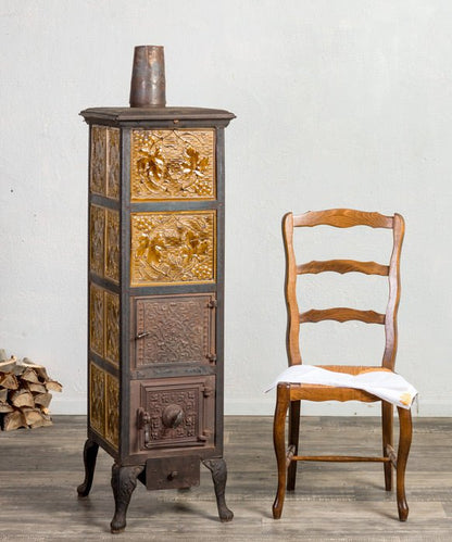 Estufa antigua de hierro fundido - Antique arte y decoracion