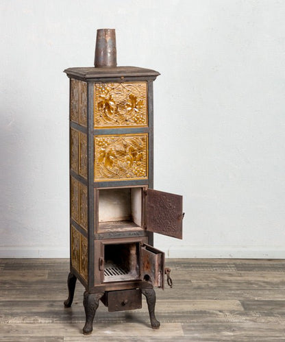 Estufa antigua de hierro fundido - Antique arte y decoracion